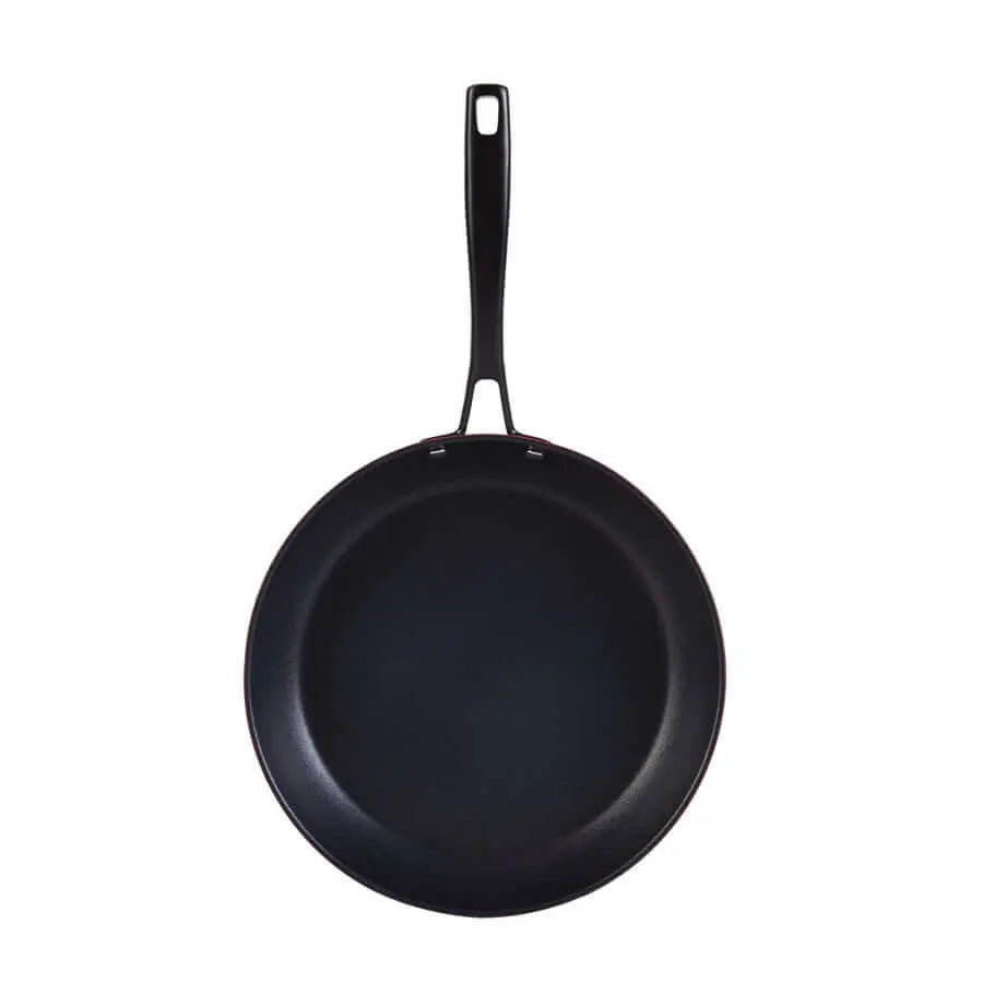 Exquisite Karaca cookware set, featuring safe, non-toxic materials and a nonstick frying pan designed for luxury home cooking.